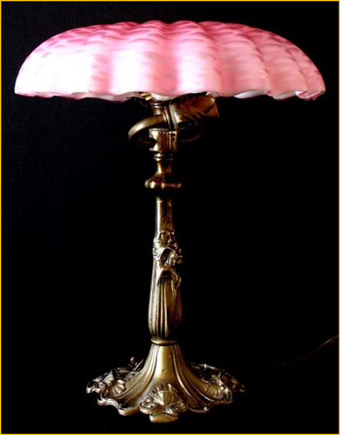 Title: French Art Nouveau Lamp - Description: Intricate cast metal base with floral motif holding a screw on pink bubble glass pink mushroom shaped shade, early art nouveau lighting from France.
