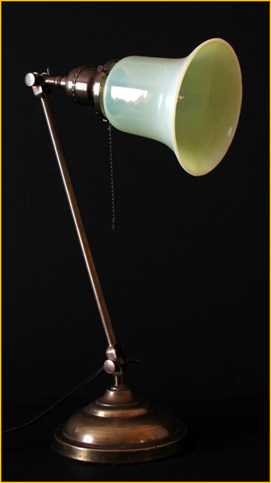 Title: Faries Desk Lamp with Vaseline Glass Shade - Description: Adjustable antique desk lampby the Faries Lamp Co., circa 1915.
This one with yellow vaseline glass shade went to New York.