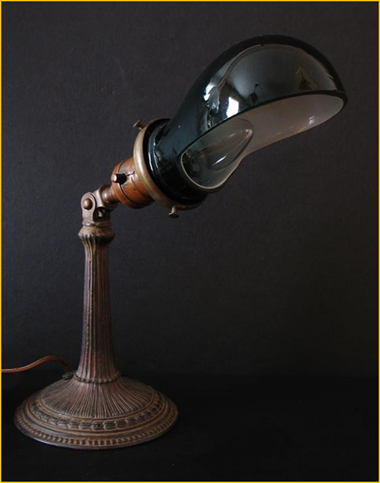 Title: Adjustable Antique Desk Lamp with elbow shade - Description: Small cast adjustable desk lamp with black elbow glass shade went to San Francisco, California.