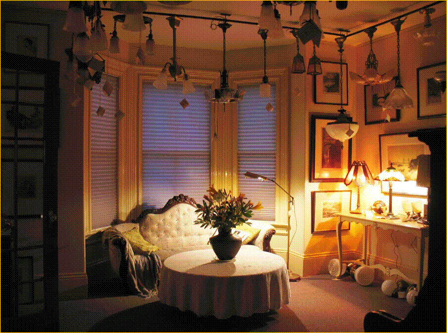 Title: Antique Porch Lights  - Description: Interior photo of Annapolis Royal antique shop, Harris House Antique Lighting, showing antique and vintage ceiling fixtures including porch lights.