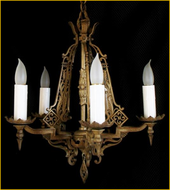 Title: Five Light Art Deco Electric Candelabra - Description: 1920s heavy cast Art Deco chandelier, five candle style with elaborate scroll patterns in an antique gold finish.